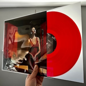 Beautiful Jazz record with an amazing design and eye-watering Transapretn Red 12-inch custom vinyl record. Jazz is a special genre. Professionally mastered by us to ensure the highest quality.