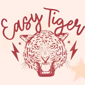 以下が含まれることがあります： 赤い白の虎の顔のイラストで、その上に「Easy Tiger」という文字が書かれています。虎は口を開けて吠えており、縞模様があります。
