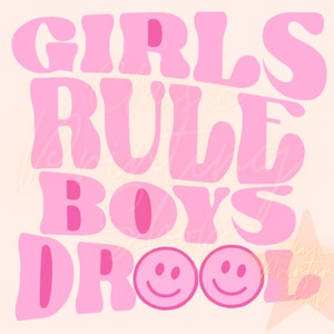 May include: Pink graphic with the text "Girls Rule Boys Drool" in a retro font style. Two pink smiley faces are below the text.