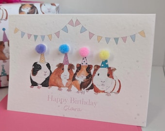 モルモットの誕生日カード - パーティーハットとポンポン