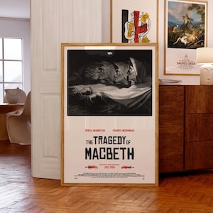 May include: A movie poster for the film "The Tragedy of Macbeth" starring Denzel Washington and Frances McDormand. The poster features a black and white image of three people in a dark setting. The title of the film is in red and white text.