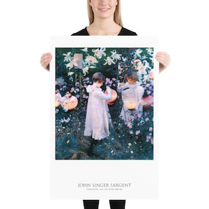 May include: A rectangular art print featuring John Singer Sargent's painting Carnation, Lily, Lily, Rose (1885-86). The artwork depicts two figures in white dresses lighting paper lanterns in a garden filled with white lilies and pink roses.