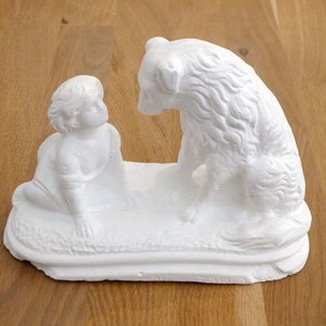 Small plaster sculpture of a Child & a Dog, Belle and Sebastian