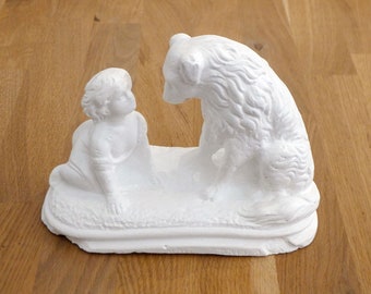Small plaster sculpture of a Child & a Dog, Belle and Sébastien