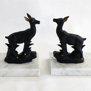 Pair of Art Deco Biches bookends, marble base