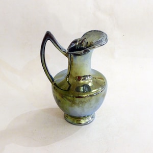 Small ewer pitcher in flamed sandstone from Rambervillers, iridescent metallic cover