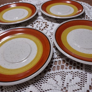 Imperial By W. Dalton Tangerine Stoneware lot of four saucers