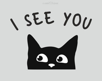 May include: A black cat with white eyes peeks over the edge of a surface, looking up with a curious expression. The text "I SEE YOU" is written above the cat.
