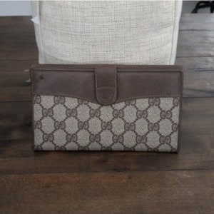 Cartera continental Supreme con monograma GG entrelazado vintage auténtica