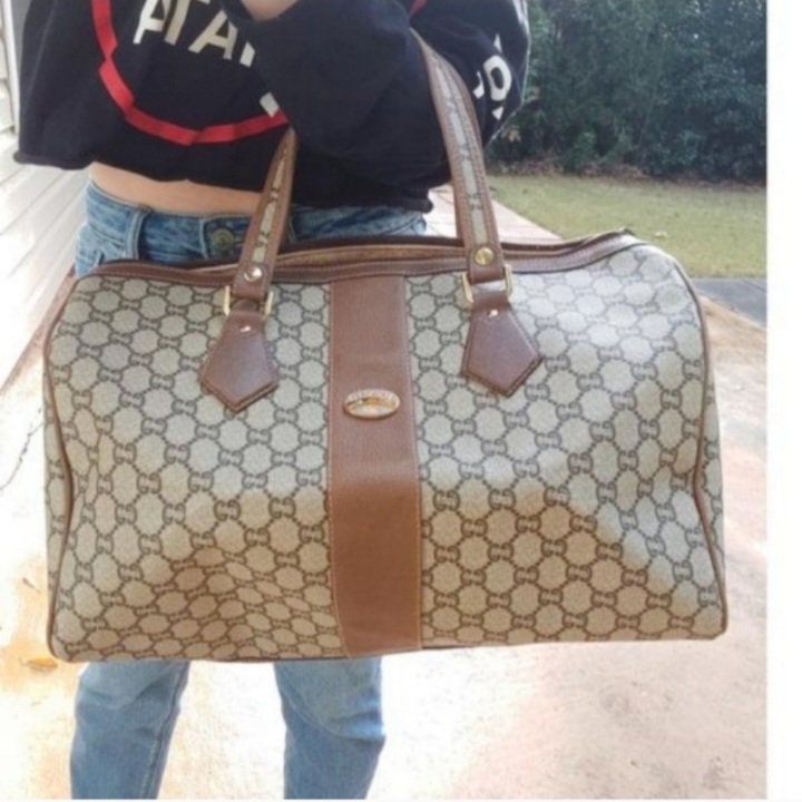 Gucci GG Embossed Leather Duffle Bag – FUTURO