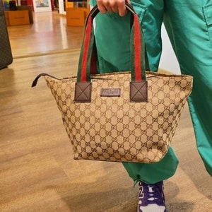 Auténtico bolso tote Gucci GG Monogram Supreme Sherry Web Satchel