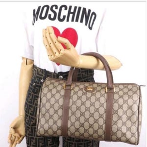 Bolso bandolera Boston Doctor con monograma GG entrelazado de Gucci auténtico y vintage