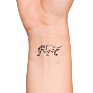 rhino outline tattoo