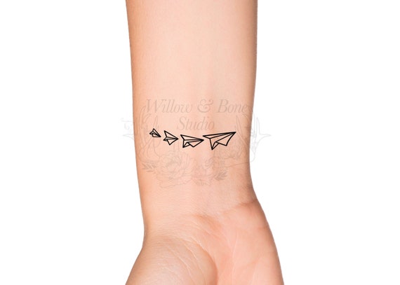 What does a paper plane tattoo mean? - Quora