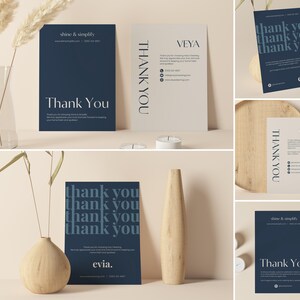 May include: A collection of navy blue and cream-colored thank you cards with minimalist designs. Some cards feature the text "Thank You" in a bold font, while others display the company name "Veya" and contact information. The cards are arranged with decorative vases.