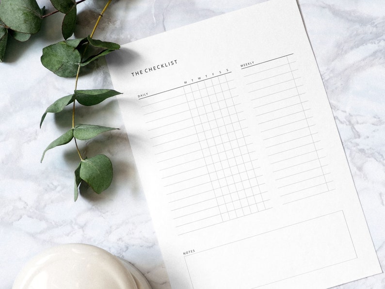 May include: A white checklist printable with the title "The Checklist" at the top. The checklist is divided into three sections: Daily, M-F, and Weekly. Each section has a grid of boxes for checking off tasks.