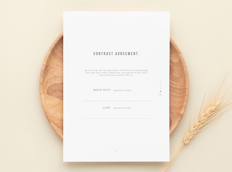 May include: A white contract agreement form with the title "CONTRACT AGREEMENT." The form has two lines for signatures and dates, one for the makeup artist and one for the client.
