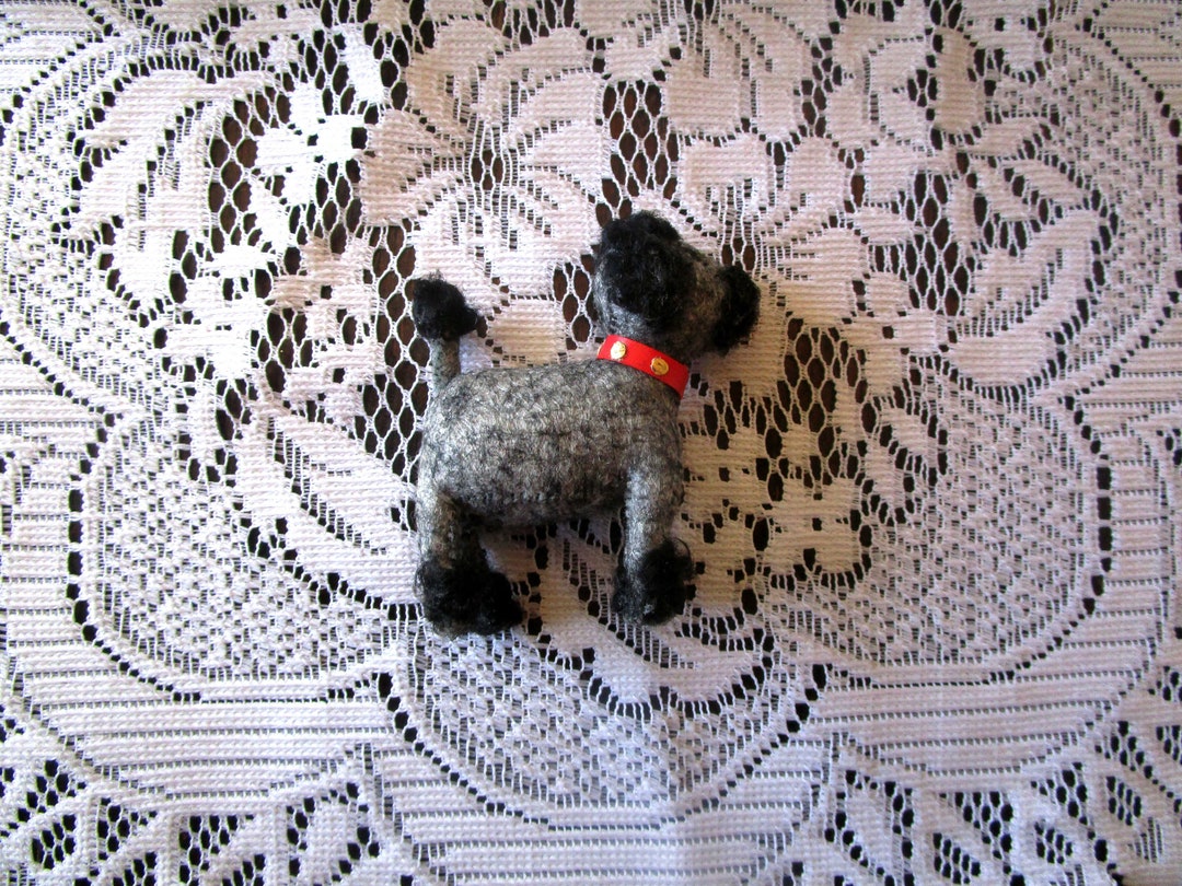 A vintage Steiff black poodle toy (no label