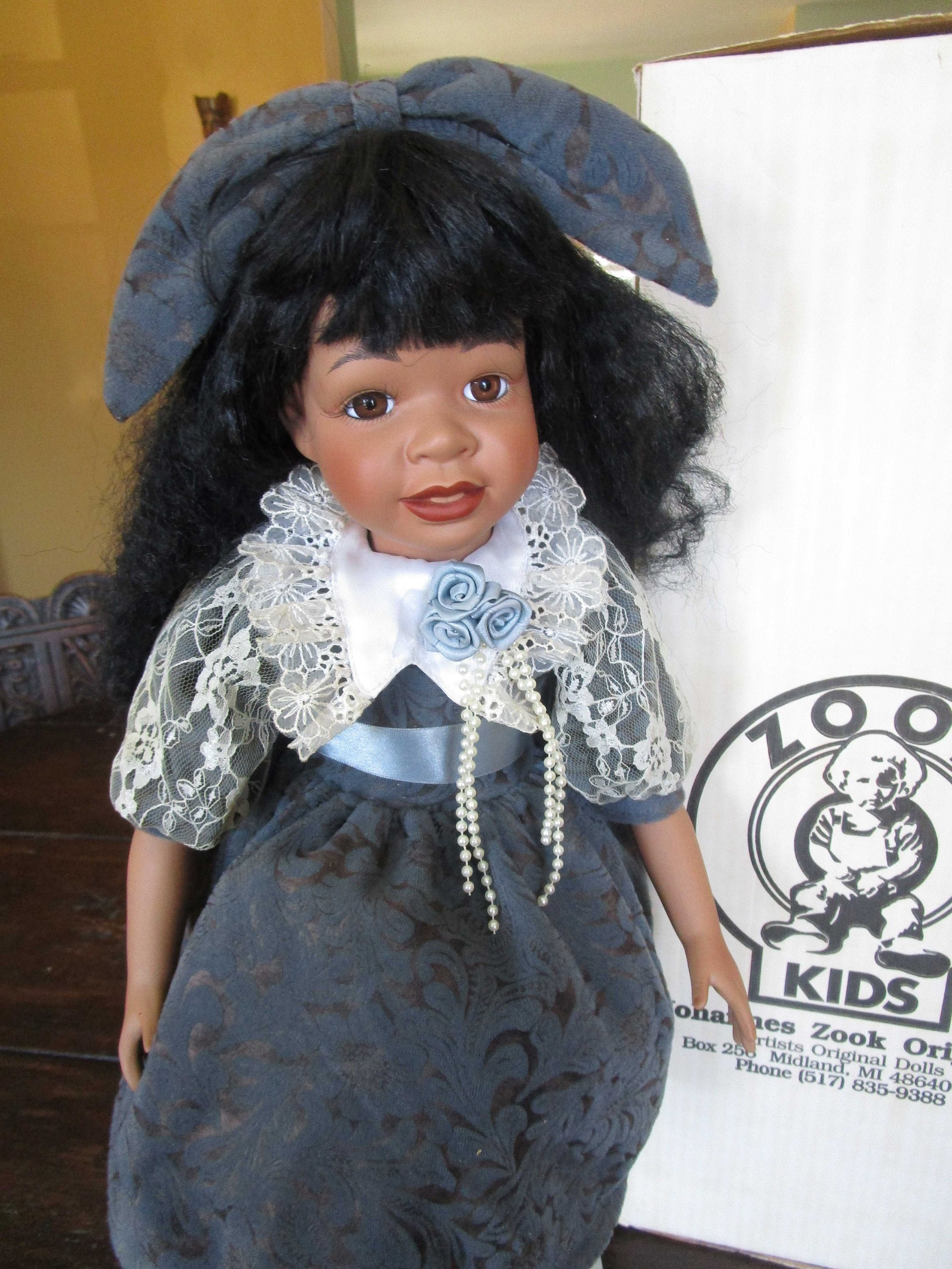 Black porcelain dolls discount