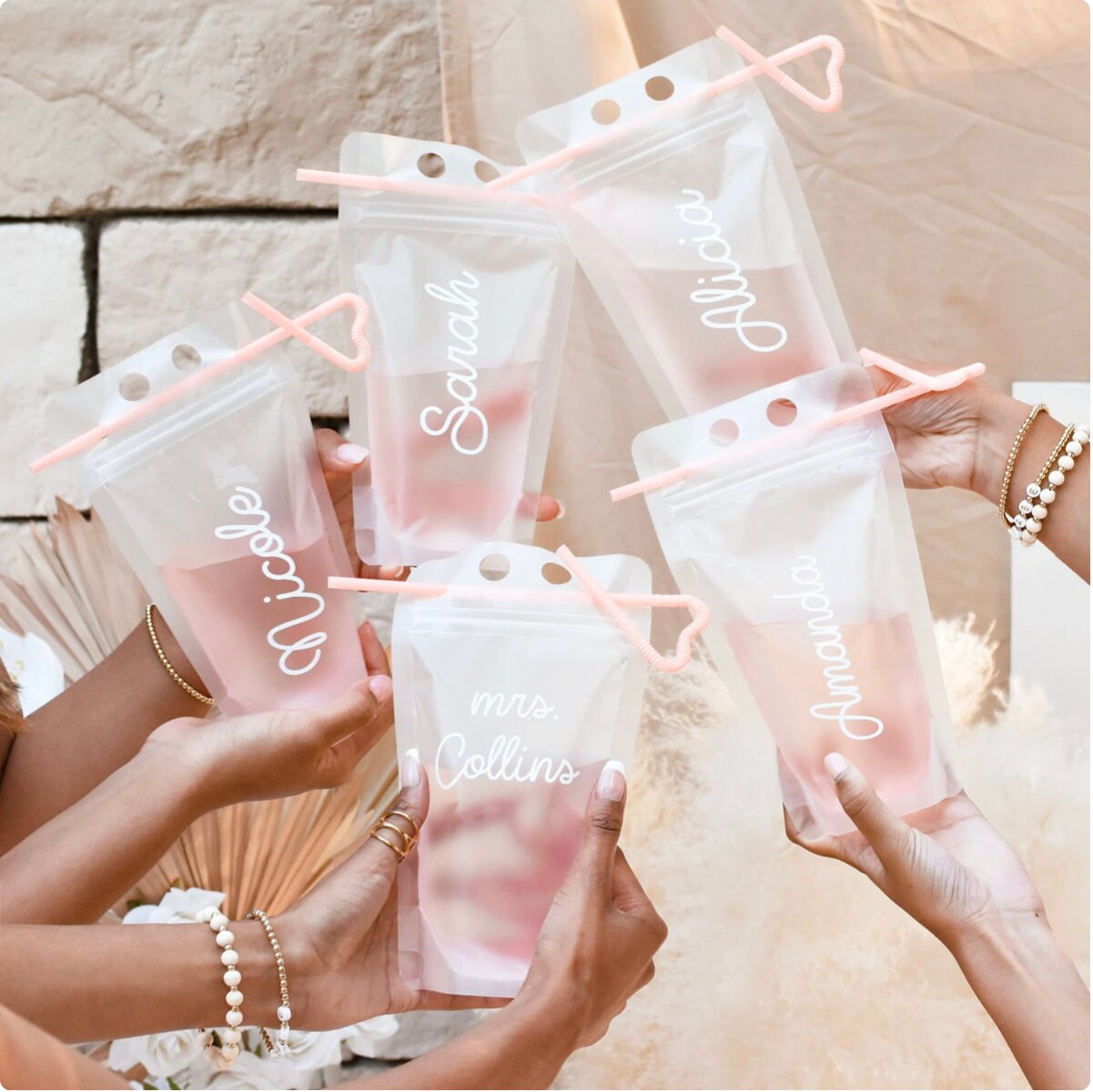 Bulk 50 Ct. Let's Party Collapsible Plastic Drink Pouches with Straws