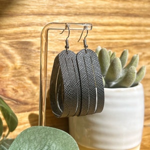 Black faux leather. Cut and curled. Handmade earrings. Gifts for her. Textured earrings.