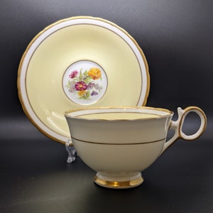 Vintage Delphine Fine Bone China Teacup And Saucer, Pastel Yellow And Floral Pattern