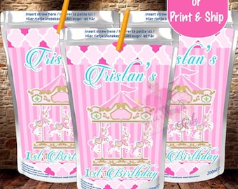 Puede incluir: Etiquetas de caja de jugo rosa y dorada con un diseño de carrusel y el texto "Tristan's 1st Birthday".