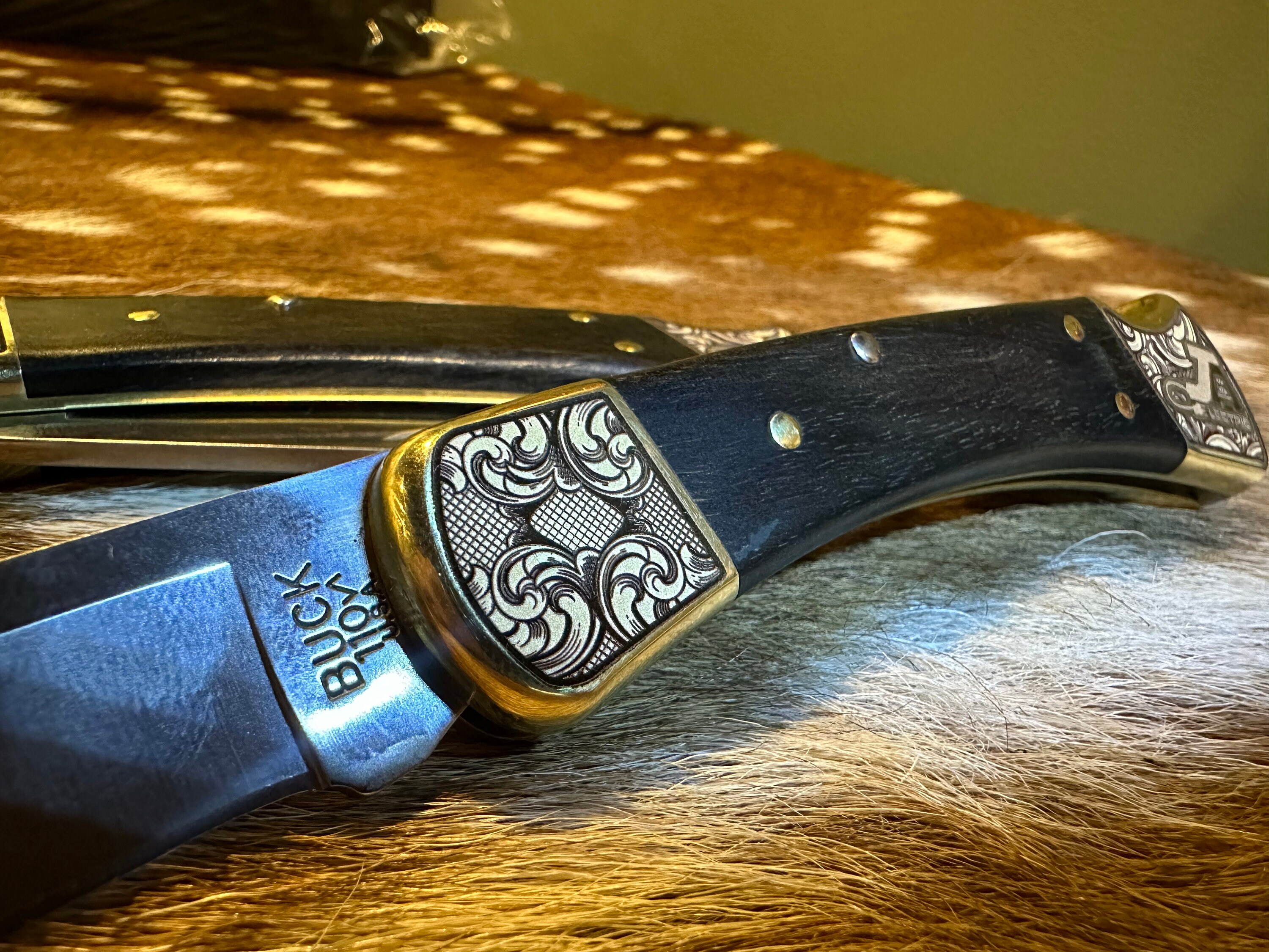 Buck 110 Classic Folding Hunder Knife with Custom Scroll Eng