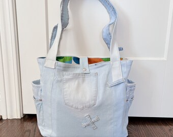 Shoulder Bag, Upcycled Jeans, Light Blue Repurposed Denim Tote with comfortable straps, Many Pockets, Unique Design, Eco-conscious Fashion