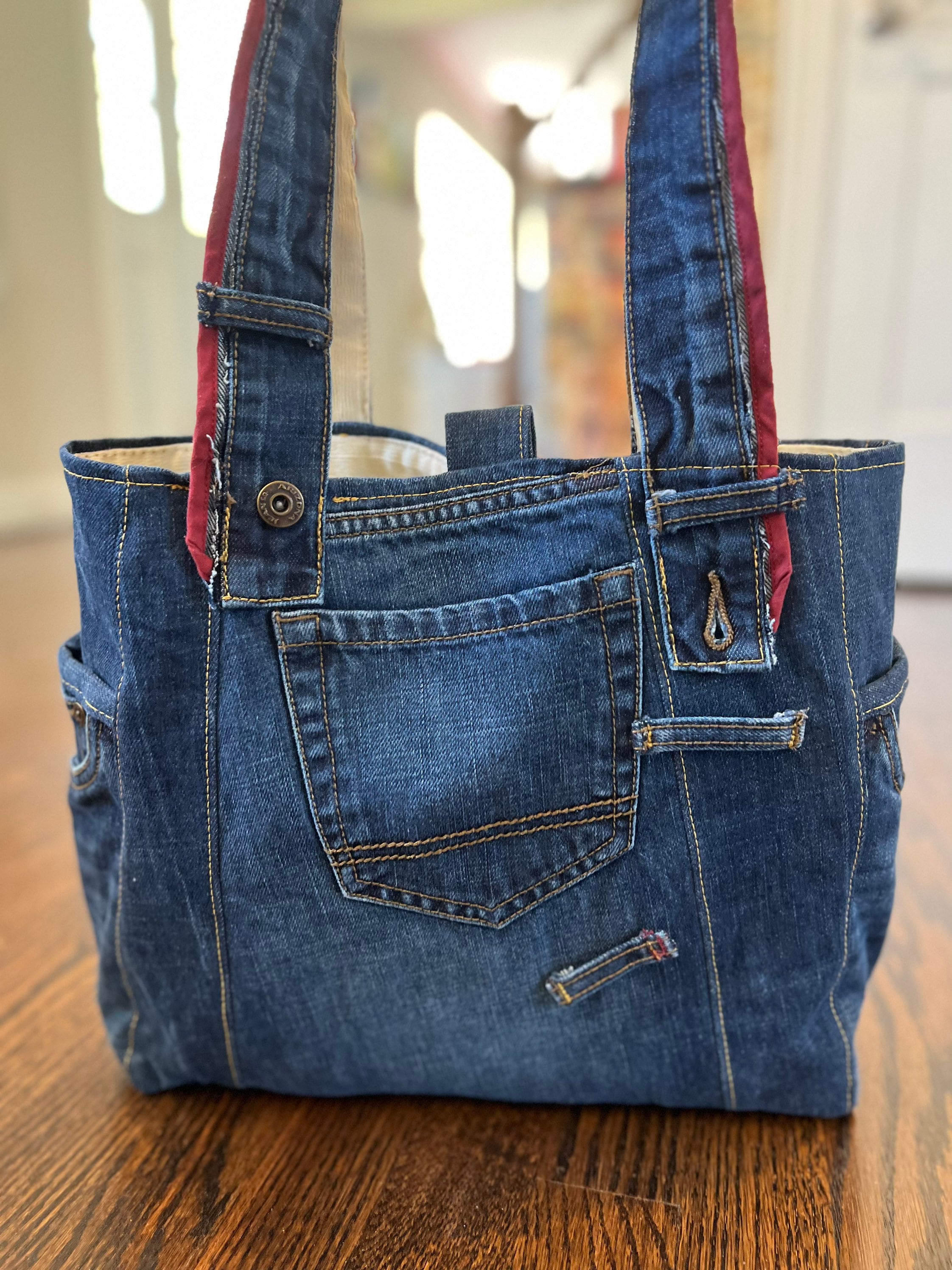 A Teddy Blake handbag and a dress over jeans