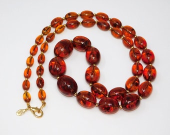 Vtg JOAN RIVERS Faux Amber Lucite Graduated Bead Necklace w/ Gold Tone Spacers