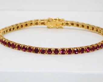 Pulsera de tenis vintage de JOAN RIVERS con cierre de cristal Swarovski rojo de 20 cm.