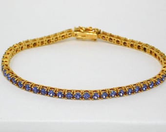 Pulsera de tenis vintage de JOAN RIVERS con cristales Swarovski morados y cierre de 20 cm.