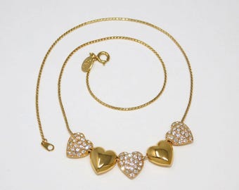 Collar deslizante acanalado reversible de 5 corazones abultados con cristales pavé de JOAN RIVERS