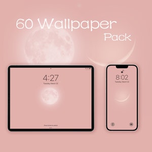May include: A mockup of a phone and tablet screen displaying a pink and white moon wallpaper with the time displayed on each screen. The phone screen displays 8:02 and the tablet screen displays 4:27. The text "60 Wallpaper Pack" is displayed at the top of the image.