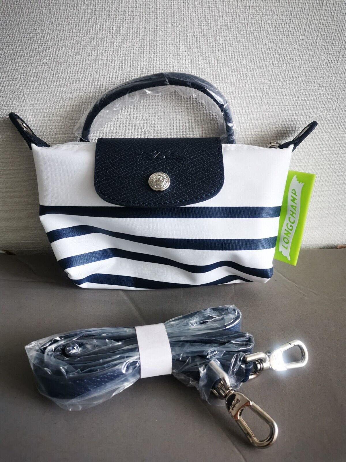 Pre-Loved Longchamp Mini Pouch handle with original strap Navy color