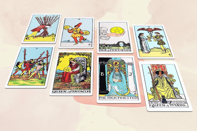 May include: A collection of tarot cards featuring colorful illustrations. The cards depict various scenes with figures, symbols, and text, including "Queen of Pentacles" and "The High Priestess." The cards are arranged on a light pink and white background.