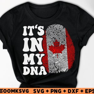 Pode incluir: Camiseta preta com texto branco que diz "It's in my DNA" e um design de impress&atilde;o digital com as cores da bandeira canadense.