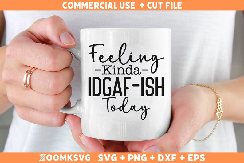 May include: White ceramic mug with black text that reads "Feeling -Kinda- IDGAF-ISH Today".