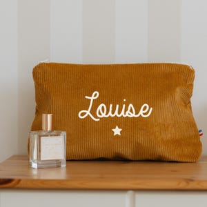 Customizable mustard corduroy toiletry bag