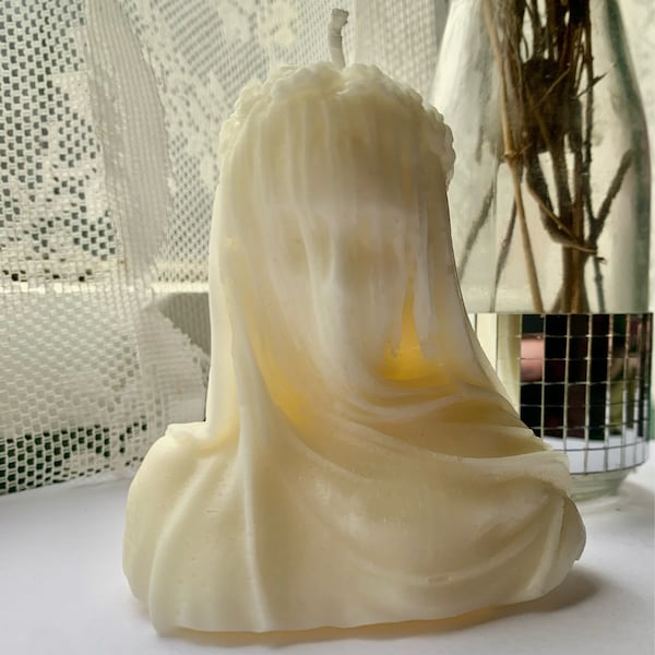 Haunted woman candle