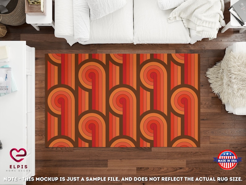 May include: A retro-style area rug with a geometric pattern of curved lines in shades of orange, red, and brown.
