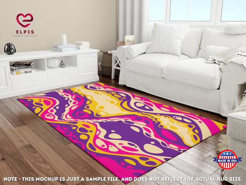 May include: Abstract area rug with a swirling pattern of pink, yellow, and purple. The rug has a modern, abstract design.