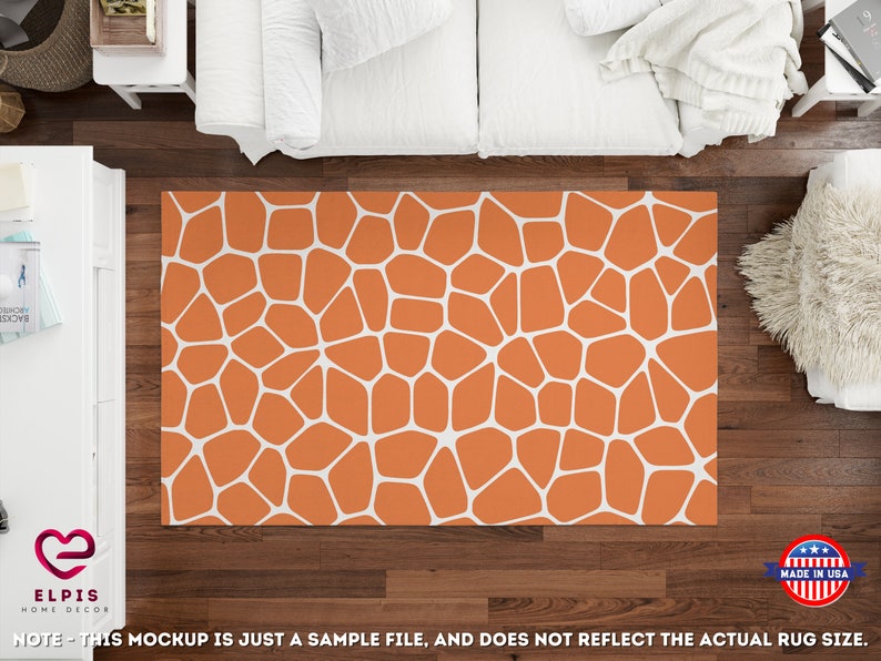 May include: Orange and white geometric patterned area rug with a white background and orange shapes.