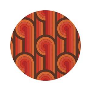 May include: A circular pattern with a retro 70s design. The pattern features curved lines in shades of orange, red, and brown.