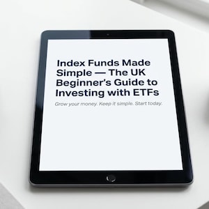 May include: A tablet displaying the text "Index Funds Made Simple - The UK Beginner's Guide to Investing with ETFs" sits on a white surface. A small succulent in a gray pot and a white mug of coffee are also present.