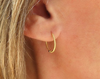 Twisted women's hoop earrings available in silver or gold, small minimalist earrings, hoops individually or in pairs