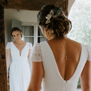 Fine back necklace with gold and natural white pearl beads