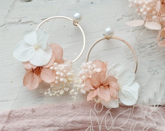 Hoop earrings with fresh old pink flowers.
