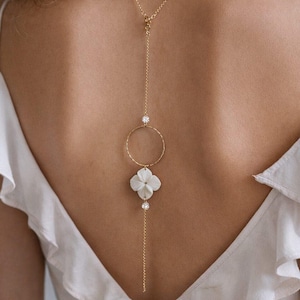 White hydrangea back necklace and gold ring with a cold porcelain feel – Hortense wedding back jewelry